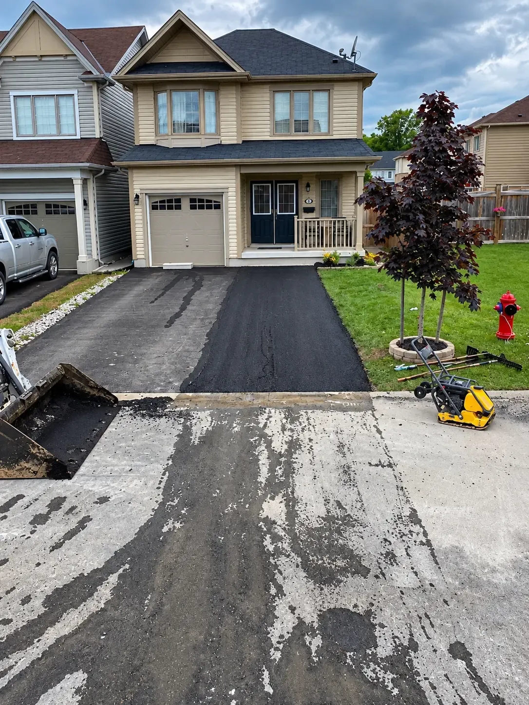Residential driveway asphalt work